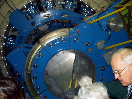 The telescope optics are behind the
                       bulkhead, out in the cold, while the
                       electronics bolt where the fancy piece of
                       aluminum is now where it is all nice and comfy. If you look carefully, you can see the round plate in the middle where the light will come out.